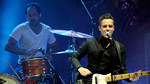 The Killers talk about sounding English and performing live