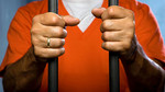 Click here to listen to Afternoon Play. Image: An inmate behinf bars.