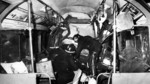 Click here to go to the In Living Memory web page. Image: Firemen working through wrecked carriage at Moorgate