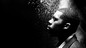 Flying Lotus sits in